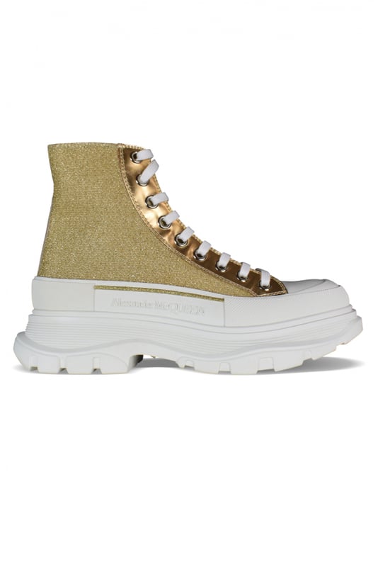 Sneakers altas Alexander McQueen Tread Slick.Lona dorada con efecto brillo.Inserciones de cuero metálico dorado.Puntera redonda con inserción de goma.Logotipo en el mostrador y en la lengüeta.Cierre de cordón plano blanco.Suela de goma blanca sobredimensionada con la firma.Made in Italy.