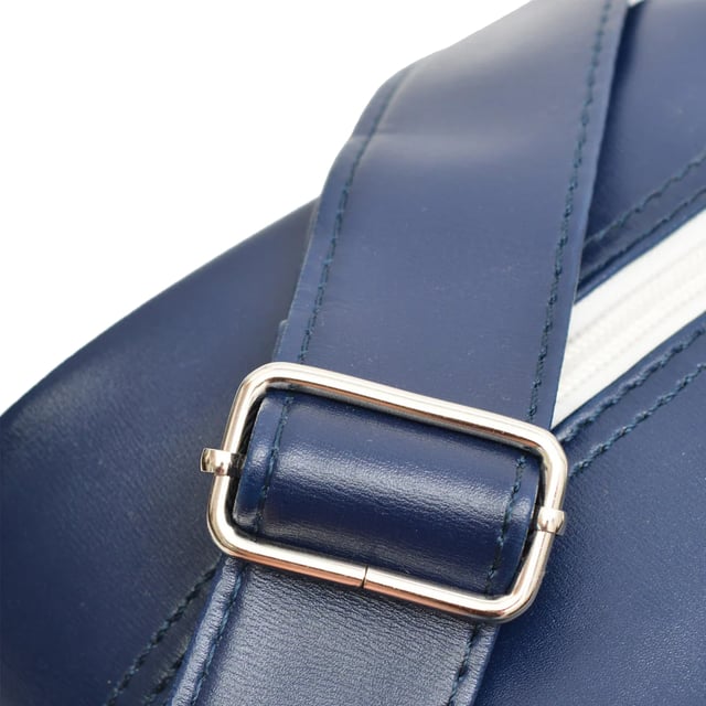 Material: PU. Width: 40cm. Height: 30cm. Pockets: Front Pocket, Zip. Adjustable Shoulder Strap, Contrast Piping, Zip Pullers. Fastening: Full Zip. Design: Logo, Printed. Compartments: Zipped Compartment.