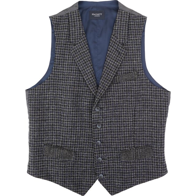 Add heritage charm to your wardrobe with this distinguished Houndstooth Tweed Waistcoat from Hackett London. Crafted in Romania with a meticulous eye for detail, this piece effortlessly blends traditional British tailoring with contemporary flair.

Color: Grey/Multi – featuring a classic houndstooth pattern with subtle color accents for added depth

Material:

Shell: 100% Wool – rich in texture and warmth, perfect for cooler seasons

Lining: 100% Rayon – soft and breathable for comfortable all-day wear

Craftsmanship: Proudly made in Romania with expert tailoring and fine finishing touches

Ideal for layering under a blazer or pairing with chinos for a polished smart-casual look, this waistcoat is a refined staple for the modern gentleman.