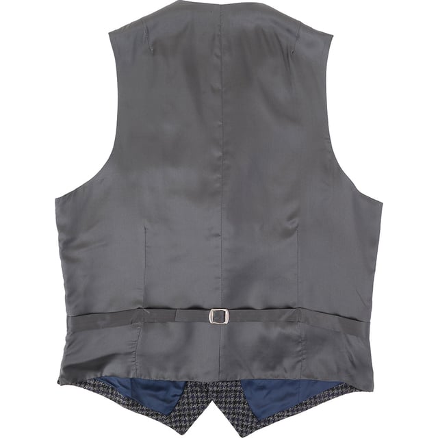 Add heritage charm to your wardrobe with this distinguished Houndstooth Tweed Waistcoat from Hackett London. Crafted in Romania with a meticulous eye for detail, this piece effortlessly blends traditional British tailoring with contemporary flair.

Color: Grey/Multi – featuring a classic houndstooth pattern with subtle color accents for added depth

Material:

Shell: 100% Wool – rich in texture and warmth, perfect for cooler seasons

Lining: 100% Rayon – soft and breathable for comfortable all-day wear

Craftsmanship: Proudly made in Romania with expert tailoring and fine finishing touches

Ideal for layering under a blazer or pairing with chinos for a polished smart-casual look, this waistcoat is a refined staple for the modern gentleman.
