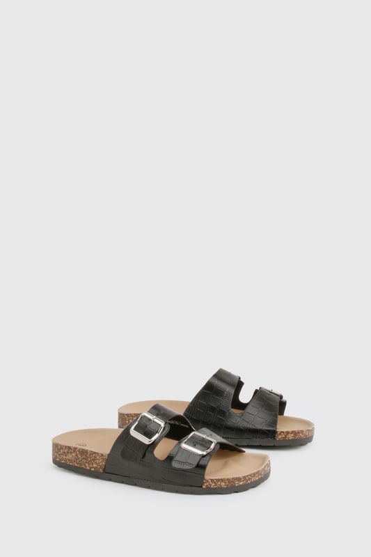 Double Buckle Croc Footbed Sliders We'll make sure your shoes keep you one stylish step ahead of the crowdWhether you're keeping it simple in sliders, living the high life in heels or joining the fash pack in flatforms, you'll be heading to shoe heaven with our fashion-forward footwear collection. Boots are your day-to-night bestfriend, giving a floral dress that tough twist - add a biker jacket for even more attitude. Find your summer feet in jelly sandals and enjoy balmy nights in block heels.