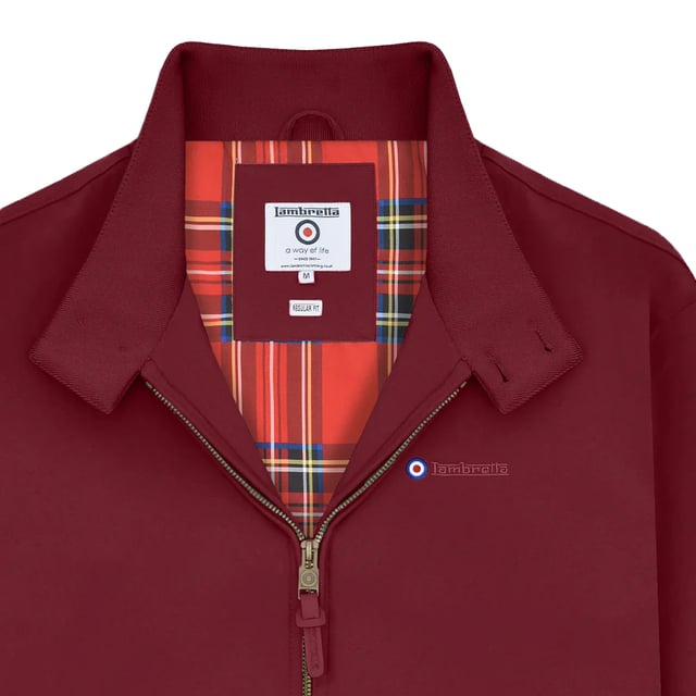 Lambretta Mens Shower Resistant Harrington Jacket (Burgundy) 100% Polyester. Lining: Tartan. Design: Embroidered, Logo, Plain, Target. Fabric Technology: Showerproof. 2 Button Placket, Branded Buttons, Woven Label. Sleeve-Type: Long-Sleeved. Neckline: Standing Collar. Fit: Regular. Pockets: 1 Inner Pocket, 2 Front Pockets. Fastening: Full Zip. Please Note: Keep Away From Fire. S: 45 in. M: 47 in. L: 50 in. XL: 52 in. XXL: 54 in. 3XL: 57 in. 4XL: 59 in.