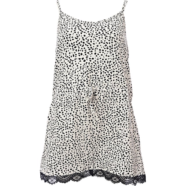 Designed with curves in mind, this striking playsuit from Ivory Rose delivers both style and support. Featuring a bold animal print and a flattering fit, it’s perfect for lounging or layering as a statement piece.

Supportive Fit: Tailored specifically for fuller busts, offering enhanced comfort and shape

Material: 95% Cotton, 5% Elastane – soft, breathable fabric with gentle stretch for everyday ease

Print: Eye-catching animal print adds a touch of fierce, feminine flair

Design: Built-in bust support, adjustable straps, and a figure-flattering silhouette

Whether you're unwinding at home or styling it up for a casual day out, this playsuit brings confidence, comfort, and a touch of wild.