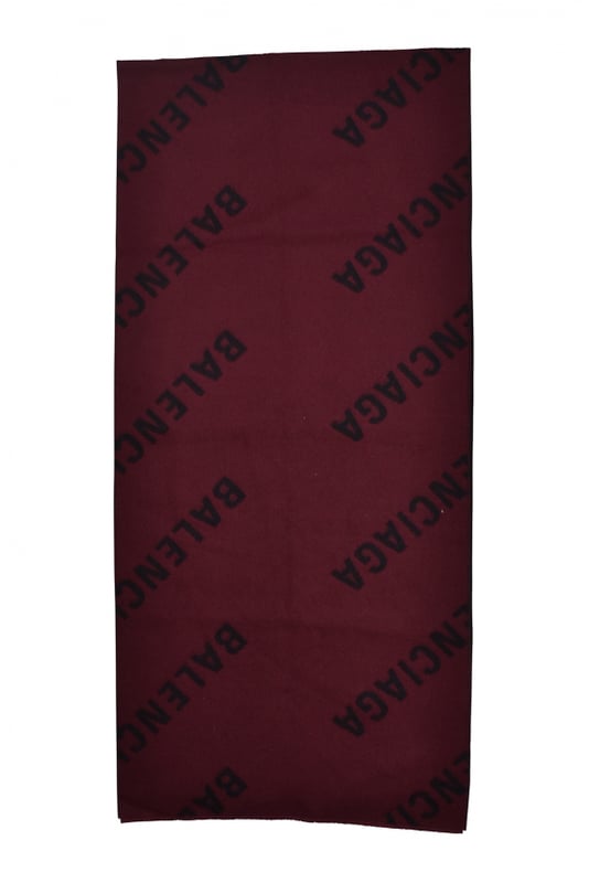 Bufanda Balenciaga bicolor negro y burdeos.Logotipo Balenciaga monogramado en ambos lados.Tamaño: 45 x 195 cm.100% lana.Made in Italy.