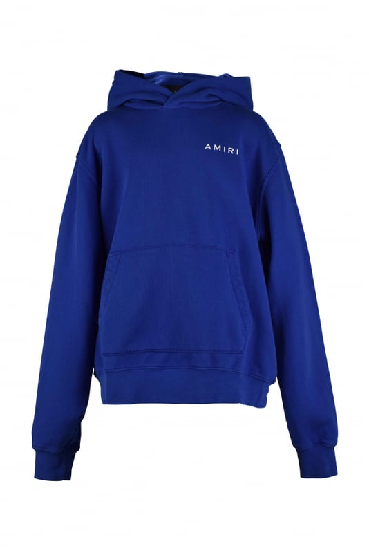 Sudadera con capucha Amiri de algodón azul.Logotipo blanco estampado en el pecho.Estampado de huesos rojo en la espalda.Bordes acanalados.Bolsillo canguro.Made in Italy.