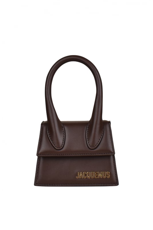 Jacquemus Le Chiquito donkerbruin minitasje.Van glad leer.Gouden Jacquemus-logo op de voorkant.Versterkt handvat.Magnetische klepsluiting.Binnenzak.Afneembare verstelbare schouderband.Afmetingen: 12 x 9 cm.Made in Italy.