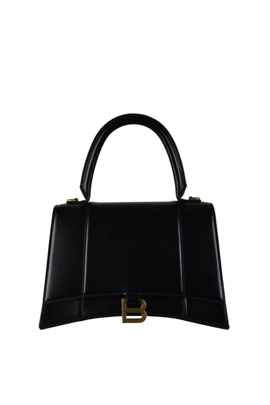 Bolso de mano grande Balenciaga Hourglass en suave piel negra.Placa con el logotipo de la firma B.Detalles metálicos dorados.Solapa en la parte superior.Asa redondeada.Bolsillo interior con cremallera.Cierre con botón de presión.Bandolera desmontable y ajustable.Dimensiones: 27 x 18,5 x 10 cm.Made in Italy.