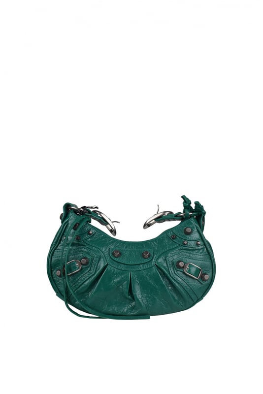 Bolso Balenciaga Cagole de piel verde turquesa.Detalles metálicos plateados.Bandolera ajustable.Bolso de hombro.Cierre principal de cremallera.Espejo extraíble en forma de corazón.Pequeño monedero extraíble.Dimensiones: 24 x 13 x 4,5 cm.Made in Italy.