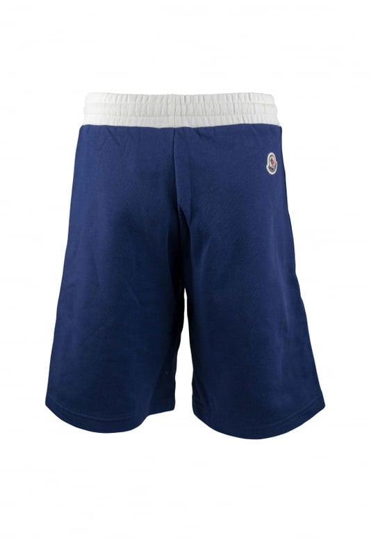 Blauwe katoenen short van Moncler.Witte strepen met blauwe strepen langs de pijpen.Wit elastiek in de taille.Opgestikt logo aan de onderkant.Zijzakken.Made in Italy.
