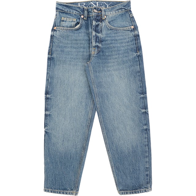 Elevate your denim collection with the RAEY Women's Organic Crop Carrot Leg Jean, made from 100% organic cotton for a sustainable and stylish fit. The cropped, carrot-leg design offers a flattering, relaxed silhouette that tapers toward the ankle for a modern, effortless look. The organic cotton fabric ensures softness and comfort, while the classic wash adds versatility to pair with a range of tops. Perfect for both casual days and elevated outings, these jeans combine eco-conscious materials with timeless style.