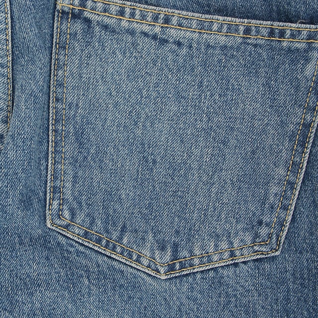Elevate your denim collection with the RAEY Women's Organic Crop Carrot Leg Jean, made from 100% organic cotton for a sustainable and stylish fit. The cropped, carrot-leg design offers a flattering, relaxed silhouette that tapers toward the ankle for a modern, effortless look. The organic cotton fabric ensures softness and comfort, while the classic wash adds versatility to pair with a range of tops. Perfect for both casual days and elevated outings, these jeans combine eco-conscious materials with timeless style.