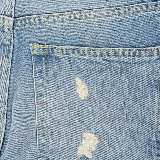 The RAEY Women's Organic Ripped Dad Jean in Blue blends laid-back, vintage-inspired style with eco-conscious design. Made from 87% organic cotton and 13% recycled cotton, these jeans offer a soft, durable fit that is both comfortable and sustainable. The relaxed "dad" fit is complemented by strategically placed rips, giving these jeans an effortlessly cool, worn-in look. The classic blue wash adds versatility, making them easy to dress up or down. Perfect for creating a casual, stylish outfit, these jeans are a modern take on a timeless design.