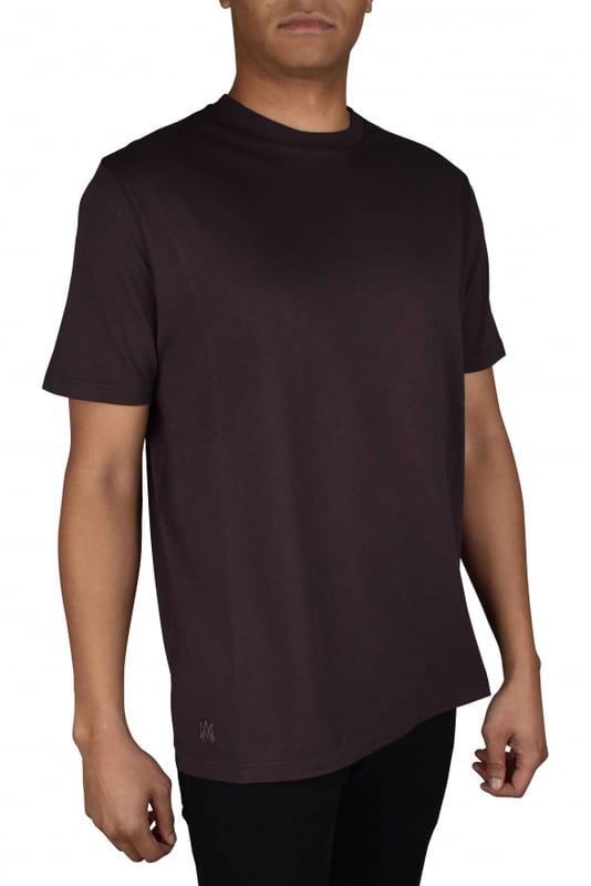 Camiseta Amiri marrón.Discreto logotipo Mike Amiri M.A. en la parte inferior de la camiseta.Corte clásico.Manga corta.