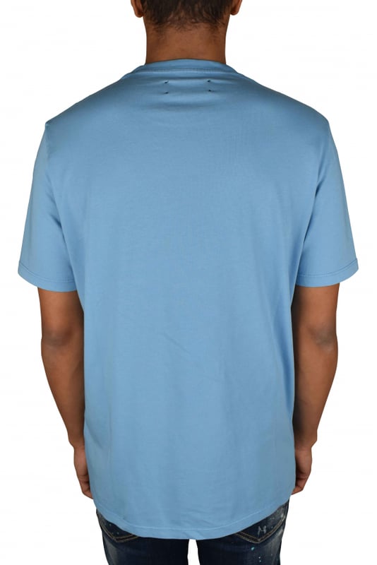 Camiseta azul claro Amiri.Estampados gráficos amarillos en la parte delantera.Manga corta.Cuello redondo.