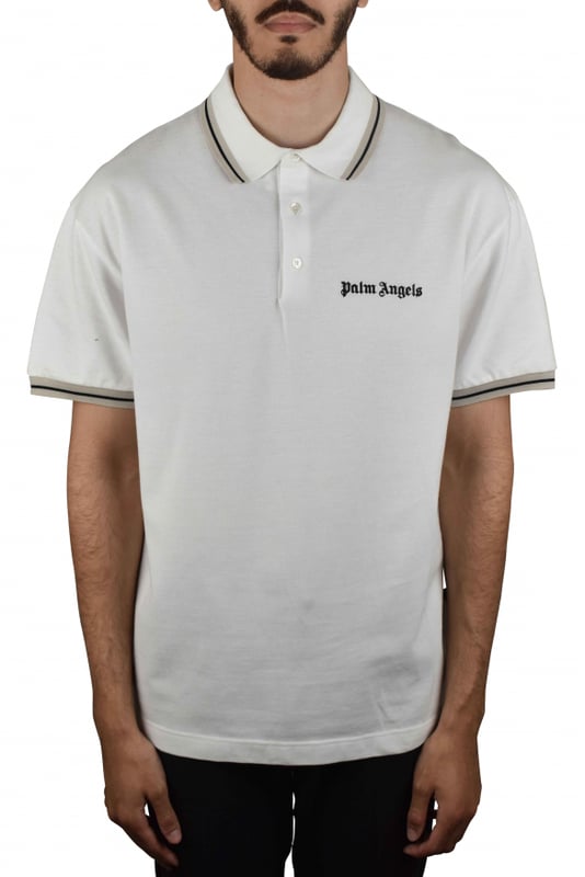 Polo blanco Palm Angels.Logotipo impreso en negro en el pecho.Ribetes a rayas en beige y negro.Mangas cortas.Cuello con botones.100% algodón.Made in Italy.