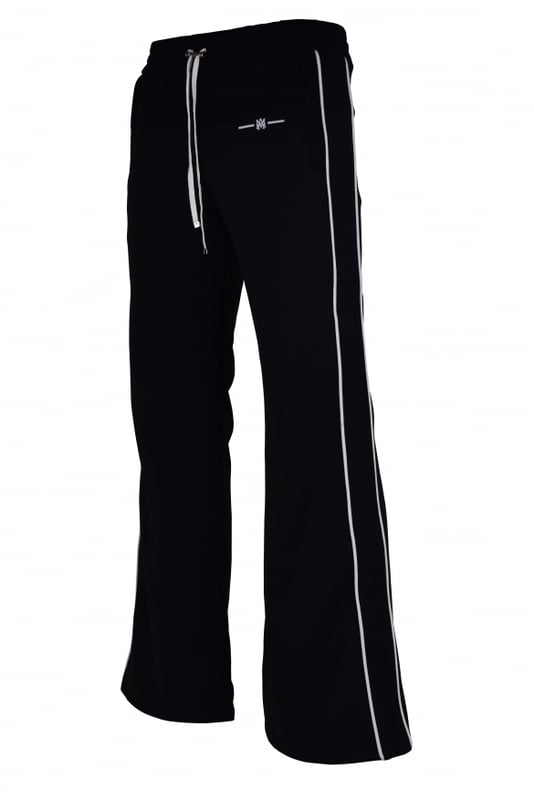 Pantalón Amiri de poliéster y algodón negro.Canesú superior de algodón negro.Canesú inferior de poliéster negro.Logotipo MA en blanco.Detalle de línea blanca a lo largo de las piernas.Bolsillos laterales.Un bolsillo trasero.Cintura con cordón elástico.Parche negro con el logotipo en la espalda.Made in Italy.