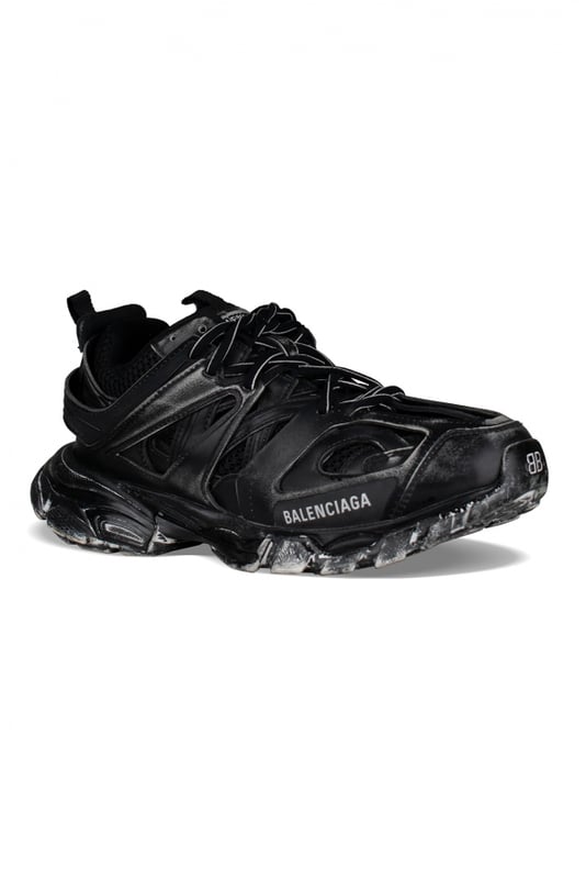 Sneakers negras Track Faded de Balenciaga.Efecto desgastado.Malla, nailon y polipiel.Talla inscrita en la puntera.Diseño con paneles.Inscripción Track en relieve en el contrafuerte.Logotipo Balenciaga impreso en el exterior en blanco.Doble cierre de cordones.Suela dinámica con refuerzo en la parte trasera.