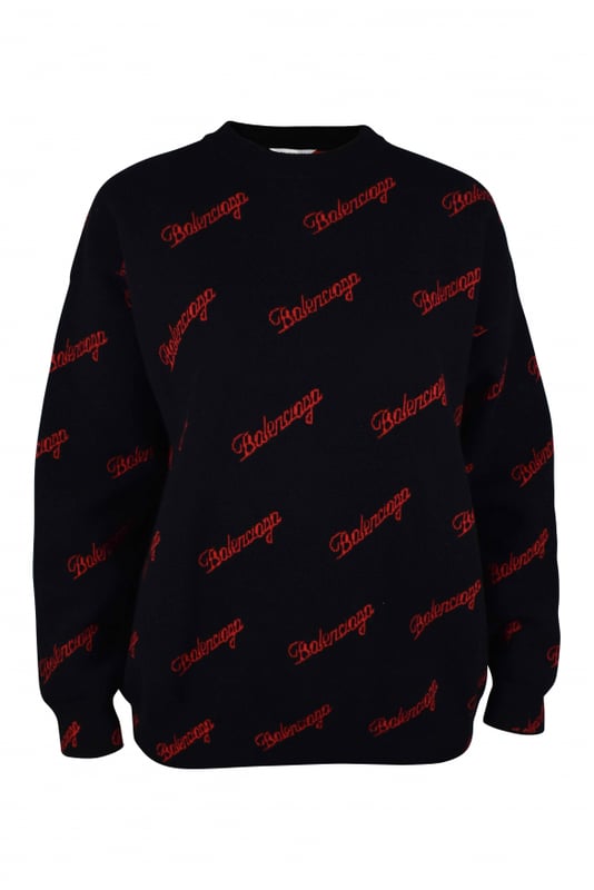 Jersey Balenciaga de lana negra.Logotipo Balenciaga rojo estampado por todo el jersey.Cuello redondo.Bordes acanalados.Mangas largas.97% lana.Made in Italy.