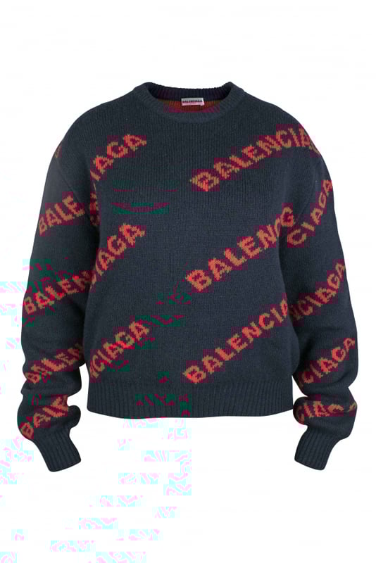 Jersey Balenciaga de lana azul marino.Logotipo rojo de Balenciaga estampado por todo el jersey.Bordes acanalados.Mangas largas.Made in Italy.