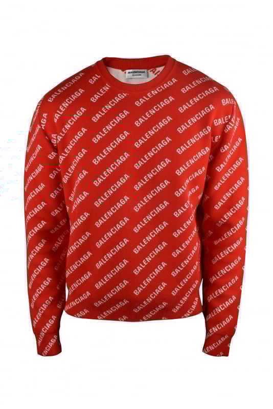 Jersey rojo de Balenciaga.Logotipo blanco de Balenciaga estampado en diagonal.Cuello redondo acanalado.Mangas largas.Puños y mangas de canalé.40% algodón, 27% lana, 22% poliéster.Made in Italy.