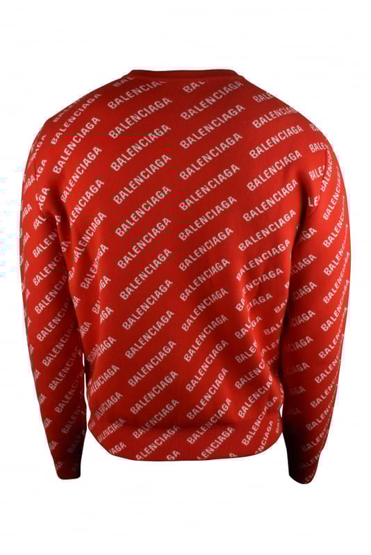 Jersey rojo de Balenciaga.Logotipo blanco de Balenciaga estampado en diagonal.Cuello redondo acanalado.Mangas largas.Puños y mangas de canalé.40% algodón, 27% lana, 22% poliéster.Made in Italy.