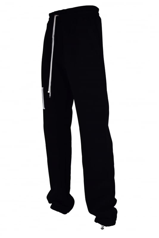 Pantalón jogging Amiri de algodón negro.Estampado gráfico Crystal Ball blanco en una pernera.Cintura elástica con cordones blancos.Logotipo negro en la parte trasera.Bolsillos laterales.Un bolsillo trasero.Tobillos elásticos con cordones.Made in Italy.