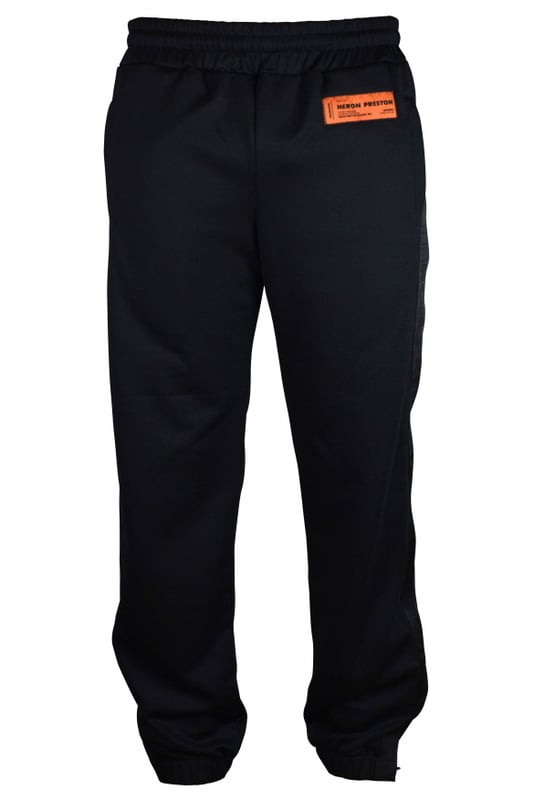 Joggers negros de Heron Preston.Dos bolsillos diagonales.Elásticos en la cintura.Logotipo de la firma en la parte delantera.Corte recto.Hecho de algodón.