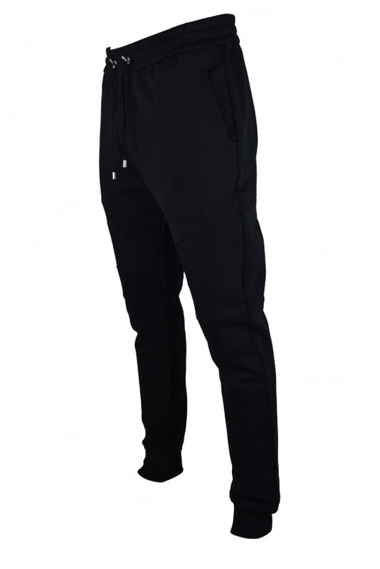 Chándal negro de algodón Balmain.Bolsillo trasero con parche de logotipo blanco.Inserciones de canalé por encima de las rodillas.Cintura elástica con cordones.Bordes de canalé.Bolsillos laterales.