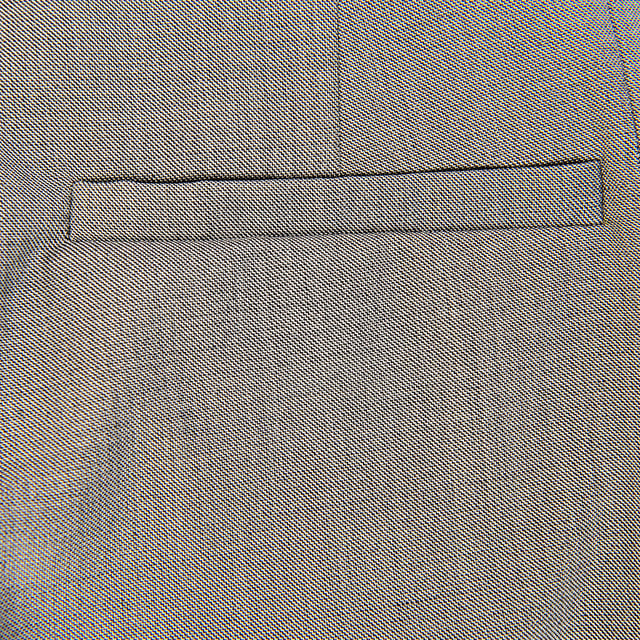 100% Organic Cotton. Raey's trousers will bring a composed look to muted edits. They're made in the UK with inverted box pleats at the waist and fall to wide legs, then are finished with back welt pockets
