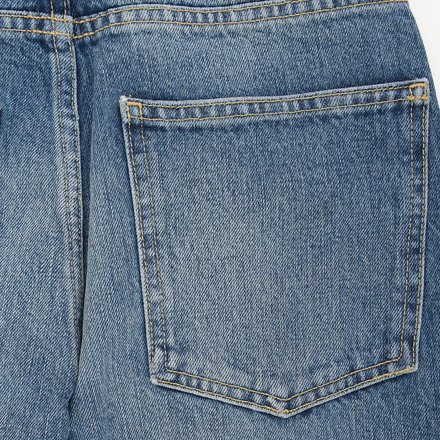 100% organic cotton. Raey's blue Dip skinny jeans are cut from organic-cotton denim treated with a dark vintage wash and light fading for a worn look. They have a high rise designed to sit high or lowered for a slouchy fit.