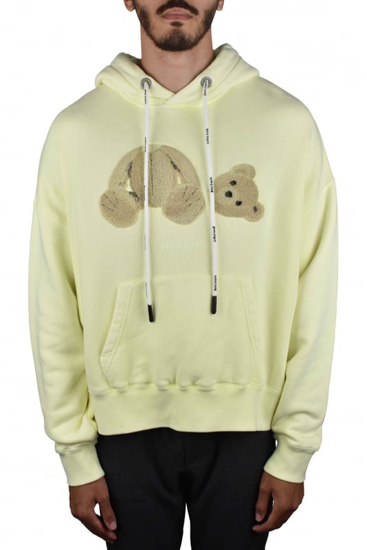 Sudadera Palm Angels amarillo pastel.Sudadera con capucha y cordones blancos.Motivo del osito Teddy.Bolsillo delantero tipo canguro.Bordes de canalé.100% algodón.Made in Italy.