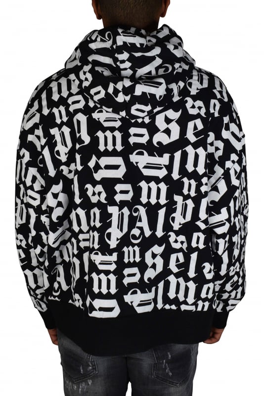 Hoodie Palm Angels broken Monogram in Schwarz und Weiß.Kapuze mit weißen Kordeln zum Zusammenziehen.Lange Ärmel.Aufgesetzte Tasche.100% Baumwolle.Made in Italy.