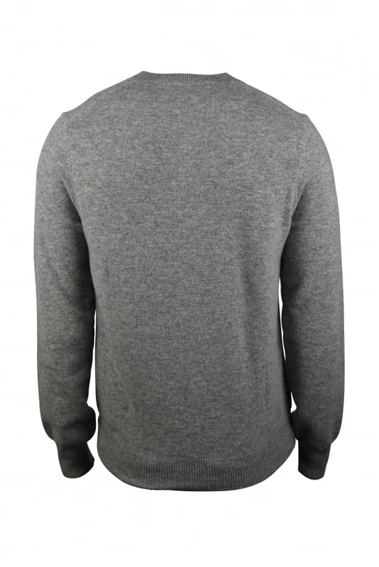 Jersey Comme des Garçons de lana gris con cuello de pico.Corazón rojo emblemático en el pecho.Mangas largas.Bordes de canalé.