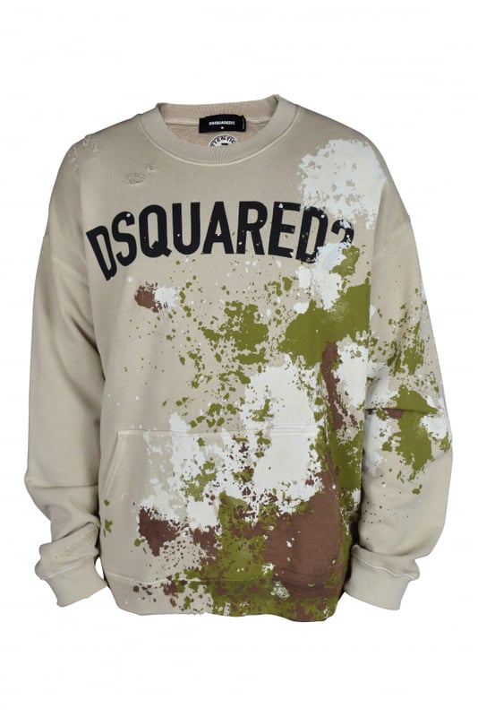 Sudadera Dsquared2 beige con manchas de pintura.Múltiples manchas de pintura de color caqui, marrón y blanco en la parte delantera y trasera.Logotipo negro  Dsquared2  en la parte delantera.Bolsillo tipo canguro en la parte delantera.Cuello redondo.100% algodón.Made in Italy.