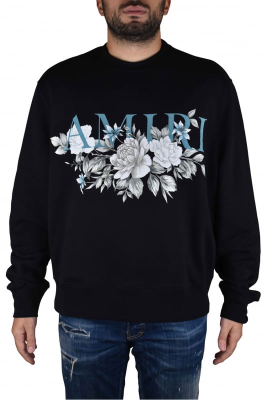 Sudadera Amiri de algodón negro.Logotipo azul turquesa estampado en el centro.Estampado gráfico de flores blancas en el centro.Cuello redondo.Bordes acanalados.Made in Italy.