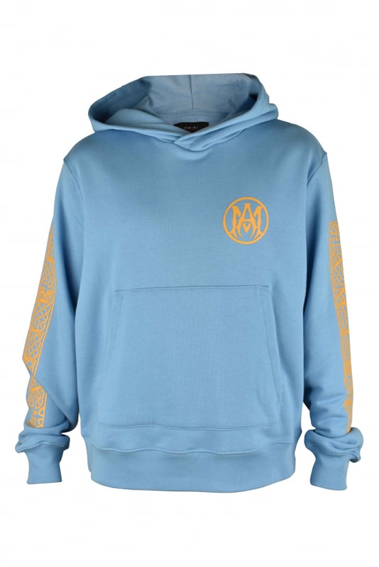 Sudadera con capucha Amiri de algodón azul.Logotipo «MA» naranja impreso en el pecho.Ouija naranja estampada en la espalda.Mangas estampadas.Bolsillo canguro.Bordes acanalados.Made in Italy.