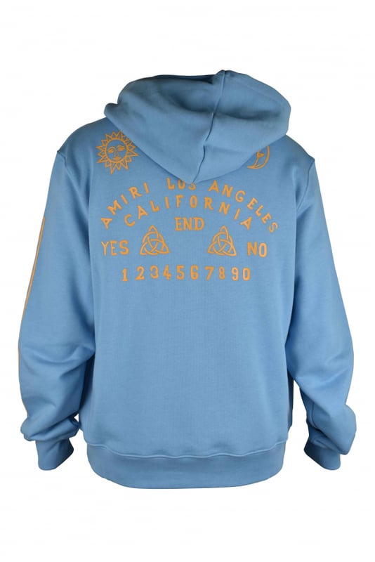 Sudadera con capucha Amiri de algodón azul.Logotipo «MA» naranja impreso en el pecho.Ouija naranja estampada en la espalda.Mangas estampadas.Bolsillo canguro.Bordes acanalados.Made in Italy.