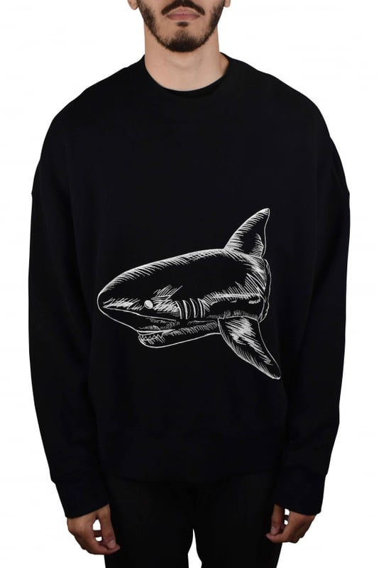 Sudadera Palm Angels de algodón negro.Estampado gráfico de tiburón blanco en la parte delantera y trasera.Logotipo impreso en la espalda.Cuello redondo.Bordes de canalé.100% algodón.Made in Italy.