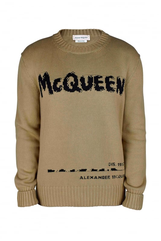 Jersey Alexander McQueen Graffiti beige.Firma McQueen Graffiti en intarsia negra en la parte delantera.Cuello redondo.Cuello, puños y bajo de canalé.Manga larga.Made in Italy.