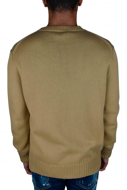 Jersey Alexander McQueen Graffiti beige.Firma McQueen Graffiti en intarsia negra en la parte delantera.Cuello redondo.Cuello, puños y bajo de canalé.Manga larga.Made in Italy.