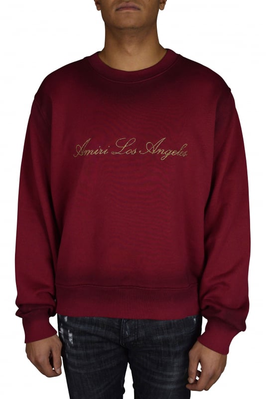 Jersey de cuello redondo Amiri Los Angeles en color burdeos.Cuello, puños y dobladillo de punto acanalado.Bordado en hilo metálico en la parte delantera.100% algodón.