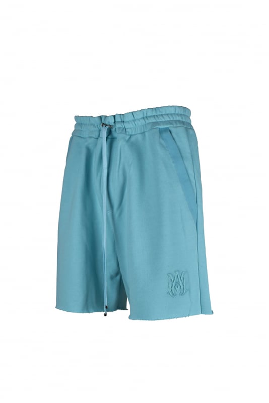 Pantalones cortos de algodón turquesa Amiri.Logotipo «MA» bordado en el bajo.Cintura elástica con cordones.Bolsillos laterales.Un bolsillo trasero.Made in Italy.