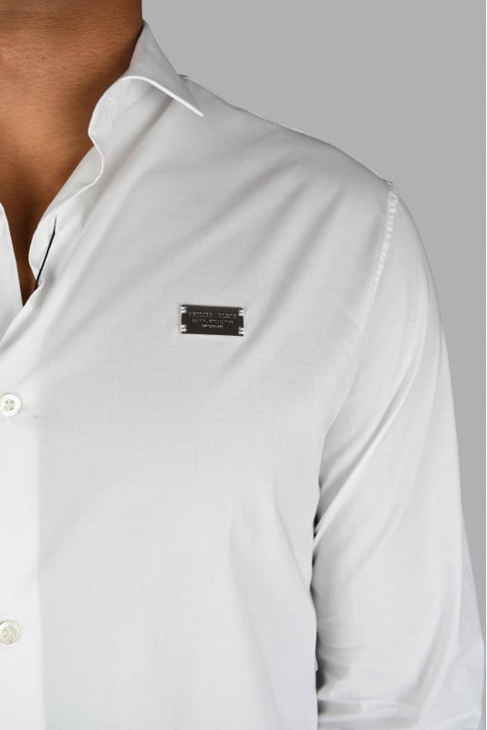 Philipp Plein Diamond Cut LS Iconisch wit overhemd.Metalen badge op de linkerborst genaaid.Beperkte oplage.Parelmoeren knopen.97% katoen en 3% elastaan.Gemaakt in Italië.