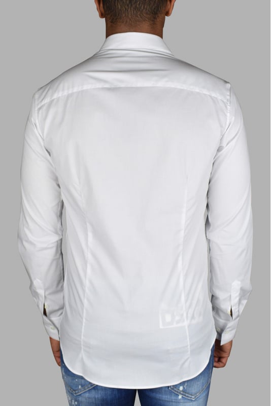 Philipp Plein Diamond Cut LS Iconisch wit overhemd.Metalen badge op de linkerborst genaaid.Beperkte oplage.Parelmoeren knopen.97% katoen en 3% elastaan.Gemaakt in Italië.
