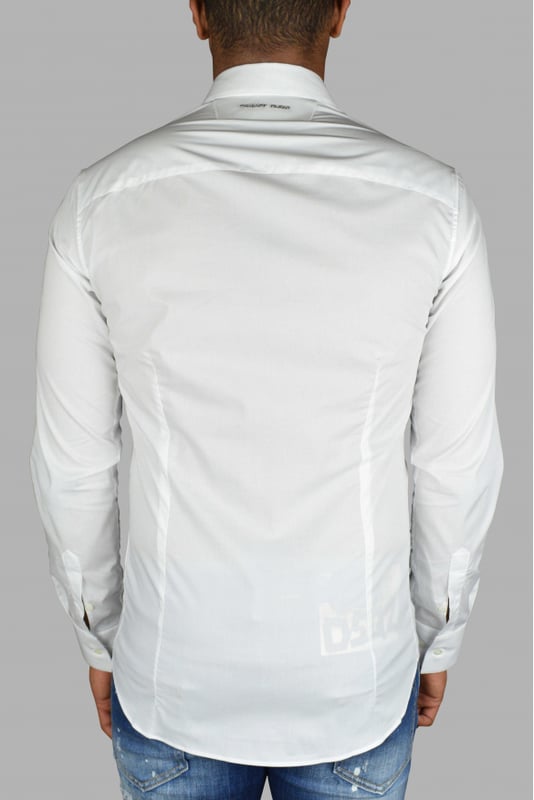 Camisa LS Skull Philipp Plein en blanco.Botones plateados en forma de calavera.96% algodón y 4% elastano.Made in Italy.