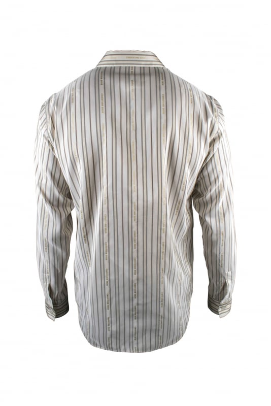 Camisa Christian Dior blanca con rayas grises y doradas.Logotipo Christian Dior bordado en línea con las rayas por toda la camisa.Símbolo  CD  bordado en blanco en la parte delantera de la camisa. Cuello clásico.Mangas largas.61% poliéster 31% seda.Made in Italy.