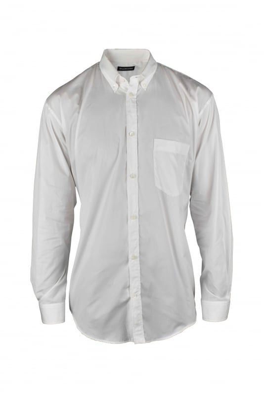 Camisa oversize Balenciaga de algodón blanco.Logotipo  BALENCIAGA  azul turquesa en la parte trasera de la camisa.Mangas largas.Bolsillo en el pecho.Cuello clásico.Cierre con botones blancos.100% algodón.