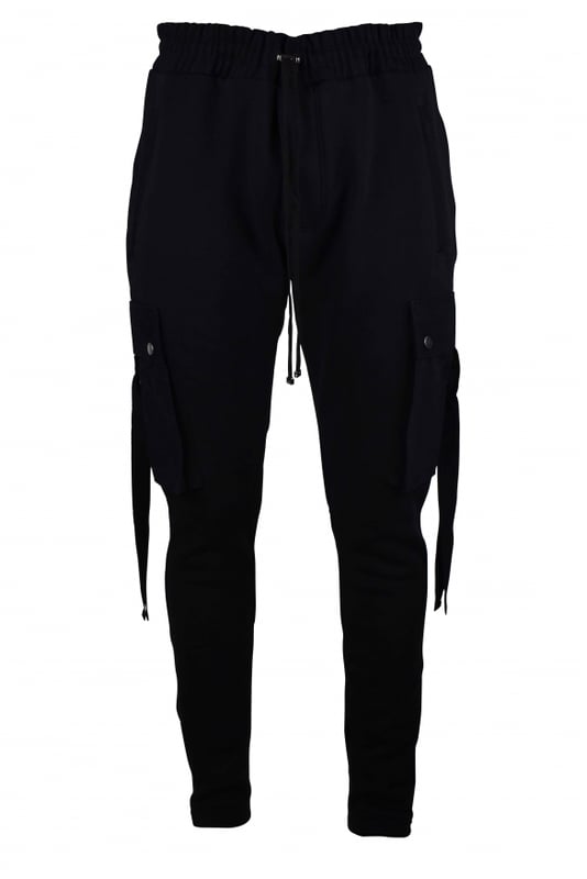 Pantalón cargo Amiri negro.Cintura con cordón. Bolsillos laterales ocultos con cremallera. Parche con logotipo de piel negra en la parte trasera.Bolsillos cargo laterales en ambas perneras con cierre de botón a presión.Un bolsillo trasero con cremallera.Detalles metálicos plateados.Dobladillo recto.100% algodón.Made in USA.