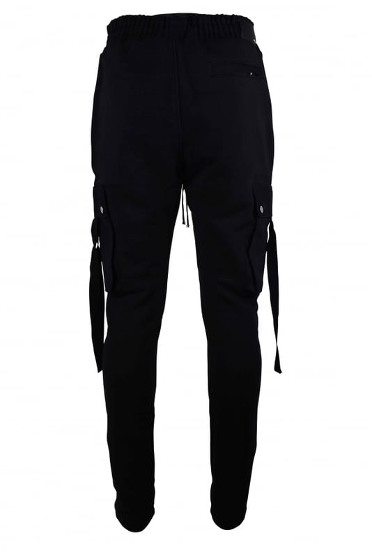 Pantalón cargo Amiri negro.Cintura con cordón. Bolsillos laterales ocultos con cremallera. Parche con logotipo de piel negra en la parte trasera.Bolsillos cargo laterales en ambas perneras con cierre de botón a presión.Un bolsillo trasero con cremallera.Detalles metálicos plateados.Dobladillo recto.100% algodón.Made in USA.