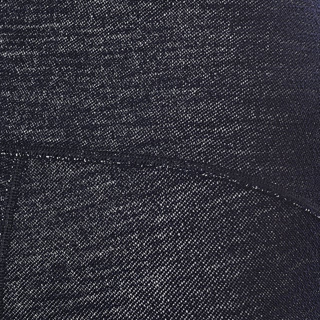 58% wool, 17% polyester, 14% cotton, 11% polyamide. Wool brings a textural note to Raey's blue denim-look leggings, made in Italy and shaped with a stretch waistband from a soft knit jersey
